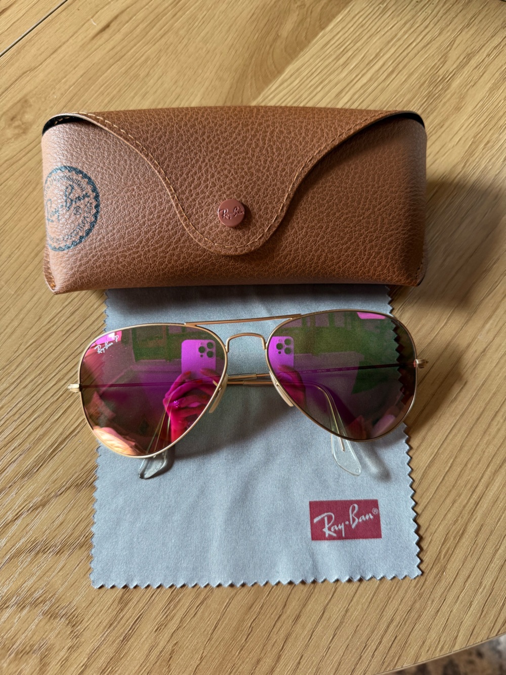 Ray-Ban Gold Frame Sunglasses with Pink Mirrored Lenses